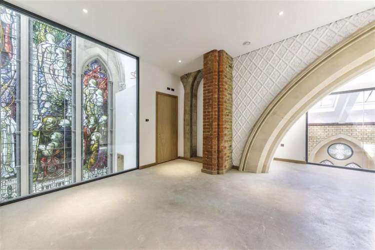 Stained-glass windows on the maisonette's second floor (Image: Rightmove)
