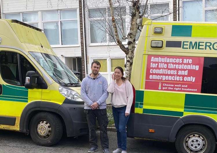 Alexandr pictured with the restored ambulances before his trip