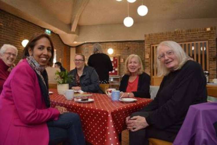 Munira attends a coffee morning in Teddington