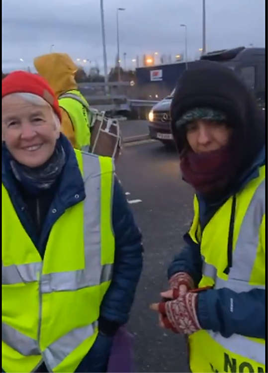 Two of the campaigners who made their protest at the staff entrance.