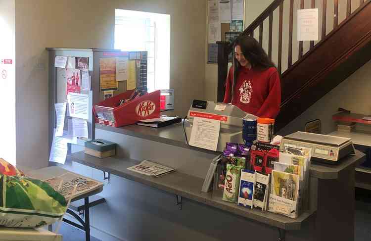 Millfield student Kezia volunteering in a Somerset village shop before helping with deliveries to those who are self-isolating