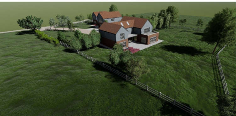 Drawings produced by the applicants site the new buildings away from existing developments.