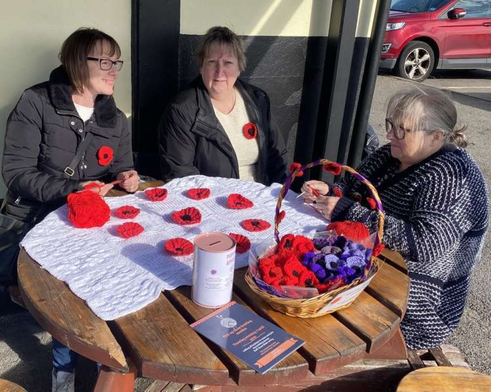 Susan Burns and fellow knitters at the Wharf pub at the launch of this year's fundraising effort.