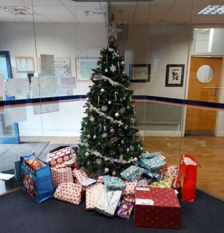 The presents under the tree at the Port of Tilbury's head office before they were delivered to Changing Pathways.