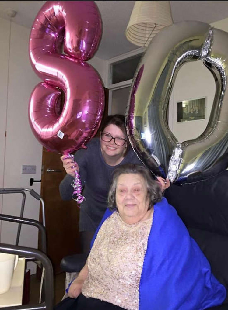 Sheila celebrates her 80th with her granddaughter Victoria.