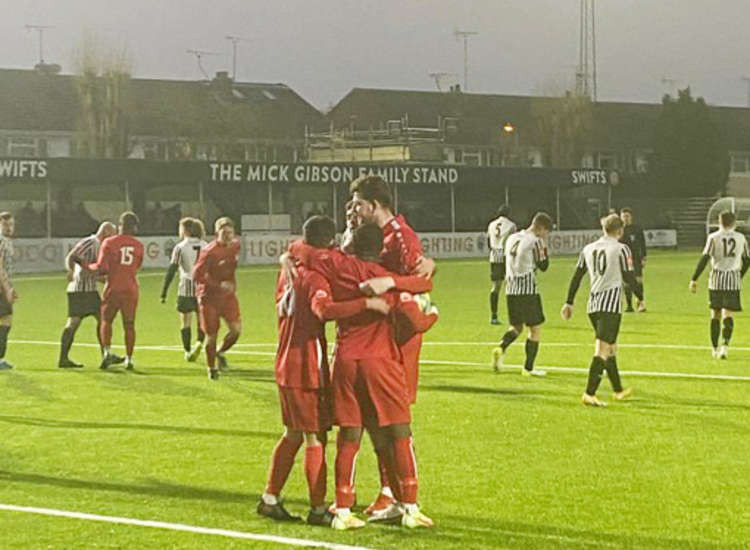 George Sykes is congratulated on his winning goal at Heybridge.