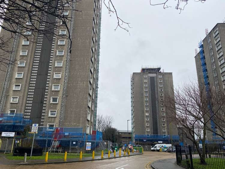 Scaffolding surrounds the tower blocks in Grays, but little work has been carried out for months and the project is well behind schedule.