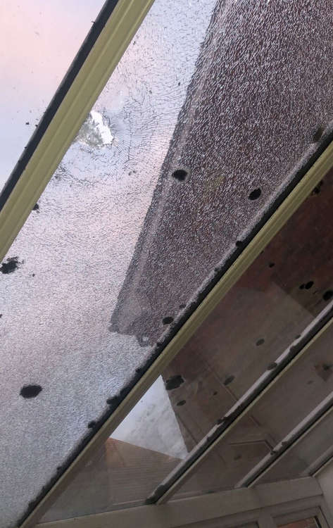 A damaged conservatory roof.