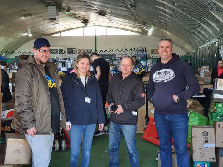 John (left) and Dean with organisers at the women and children's refuge close to the border.