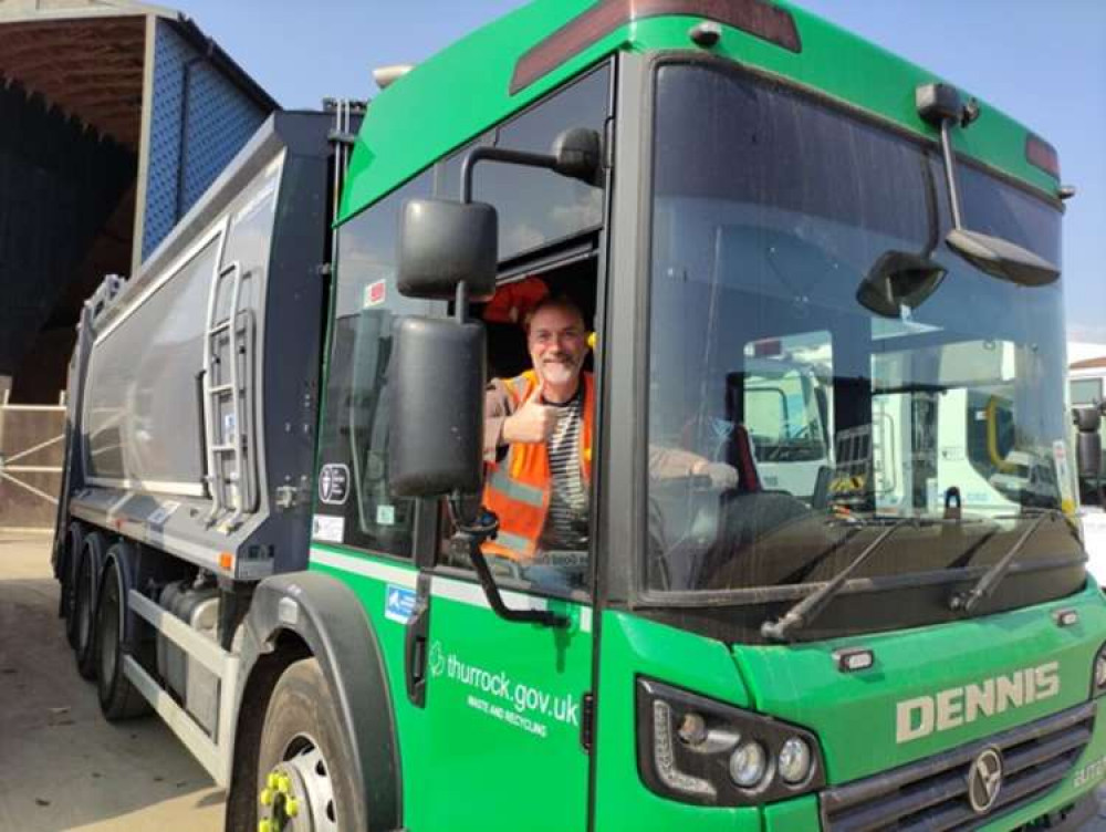 Cllr Andrew Jefferies behiond the wheel of one of Thurrock Council's new waste collection vehicles.