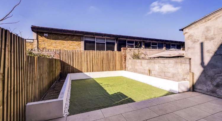 The kitchen leads out onto a landscape garden (credit: Dexters)