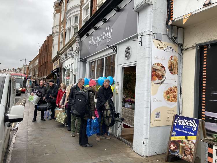 Residents from near and far lined up outside The Prosperity, in Twickenham, carrying everything from toiletries and duvets to large rucksacks to be sent off to Lviv.