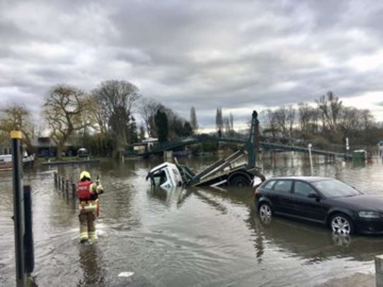 London Fire Brigade were called in after the lorry toppled off the Flood Lane car park and was left nose down in the cold, grey waters. Credit: Ruth Wadey.