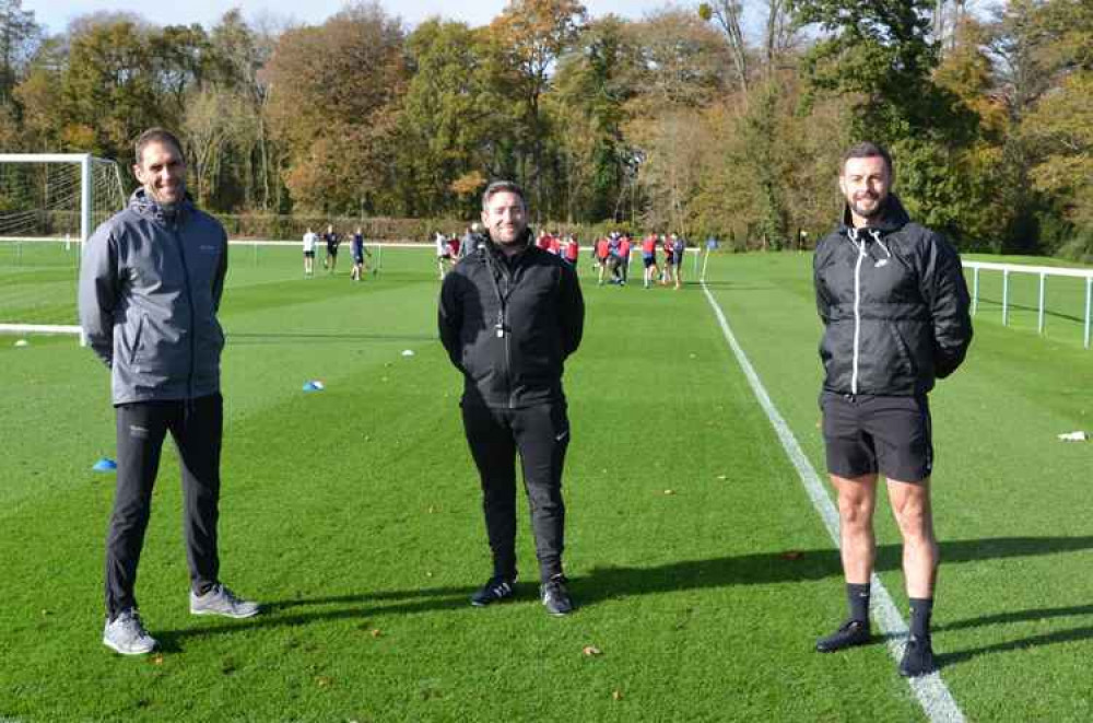 Millfield's Darren Robinson with former Bristol City management duo Lee Johnson and Jamie McAllister
