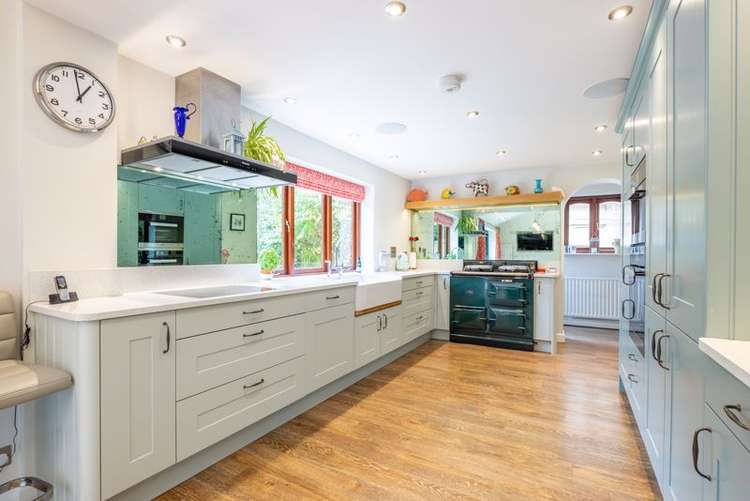 A stunning kitchen includes a gas fired Aga A stunning kitchen includes a gas fired Aga