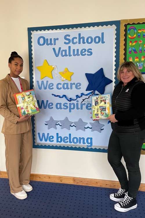 Mel Smith, Owner of Barbecue Lodges (right) with Sian Blake from Milverton Community Primary  School (left)