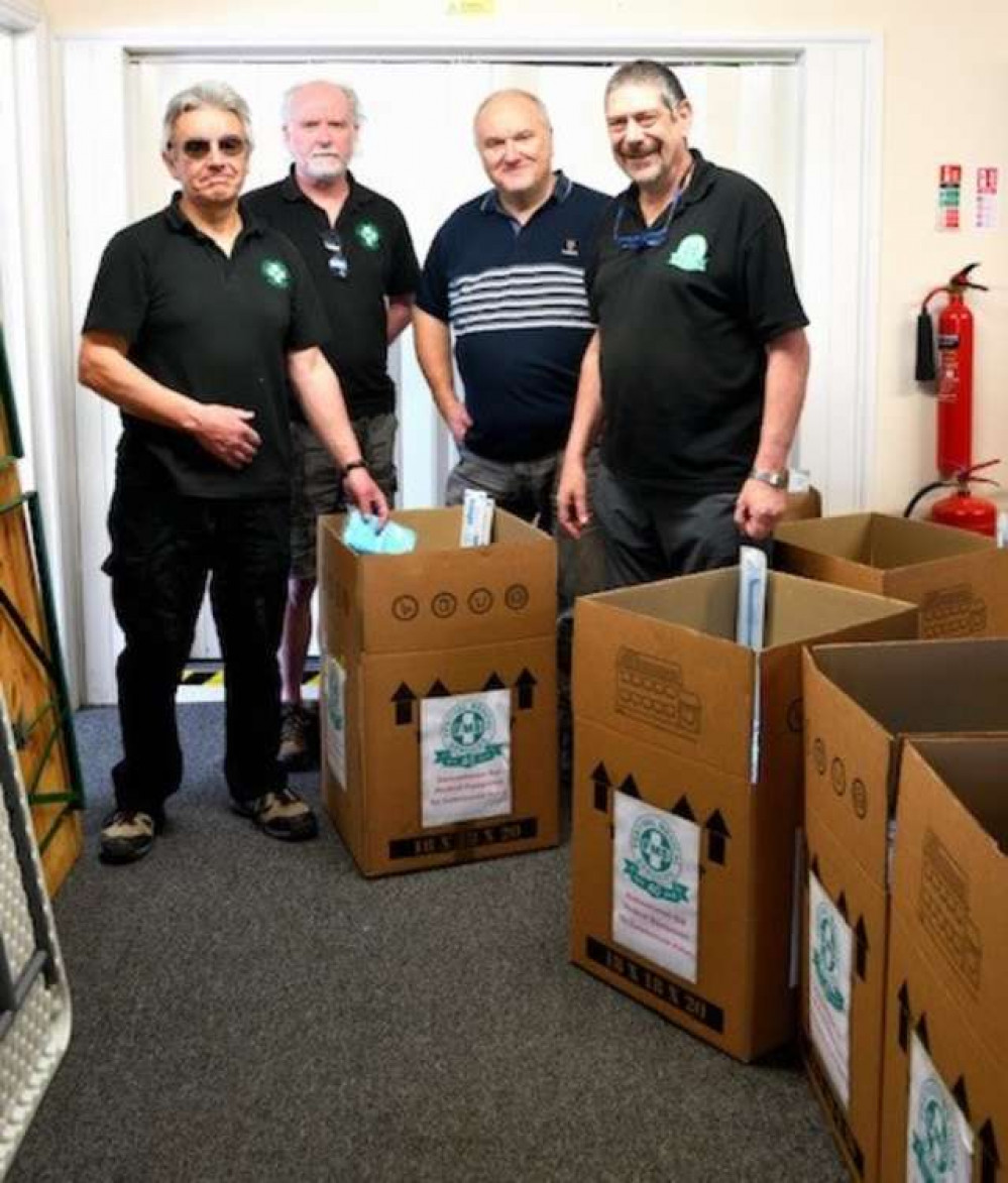 Dr Chris Howes, left, packing the trauma kits for Ukraine at FMS headquarters in Evercreech