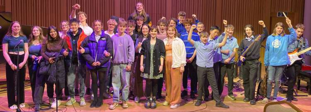 All the performers from the Blue and Cathedral schools come together on the stage at the end of the concert in Cedars Hall