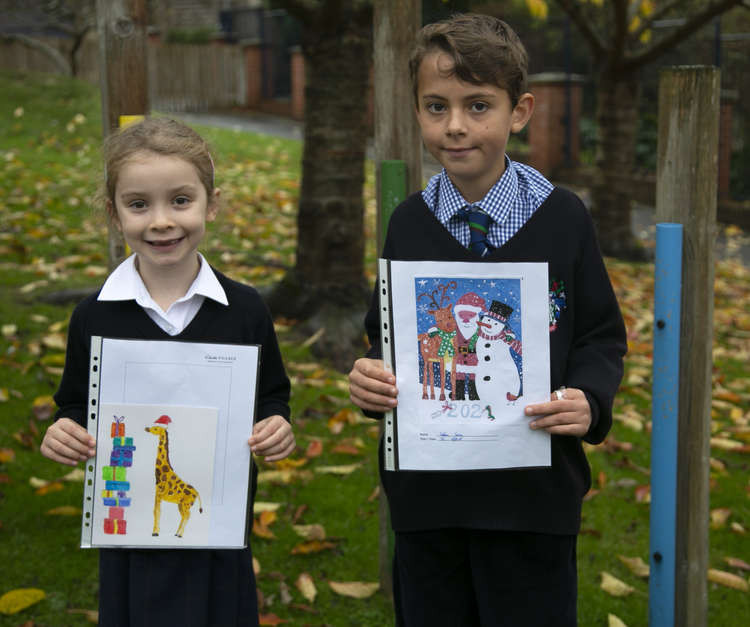 Competition winners Emily and Sebbie with their winning designs