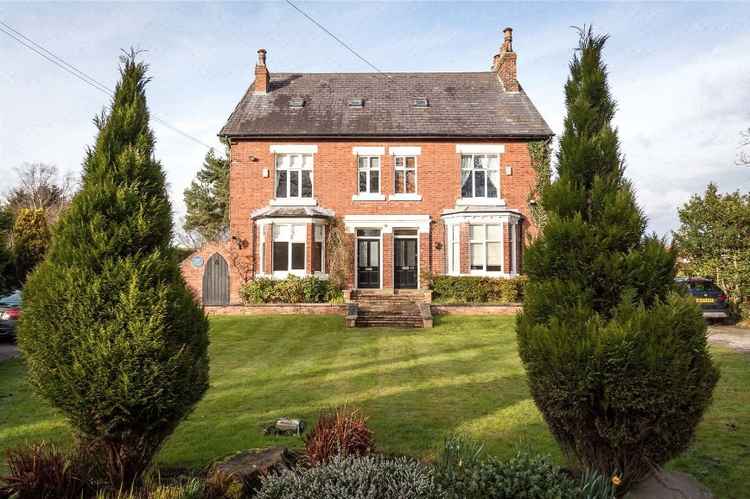 The 2900 sq ft Wilmslow family home has just come on the market with Savills. The lavish property comes with the blue plaque honouring Turing. (Image Savills)