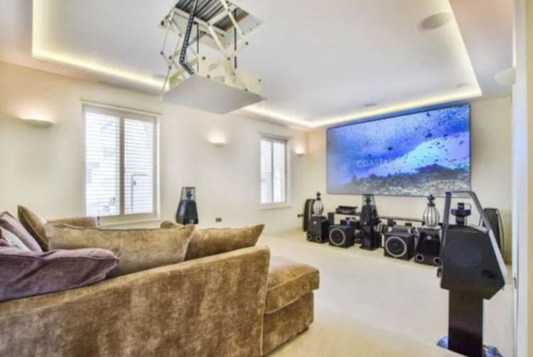 The cinema room is one of many leisure features in this spacious Finlow Hill Lane home. (Image - Bridgfords)