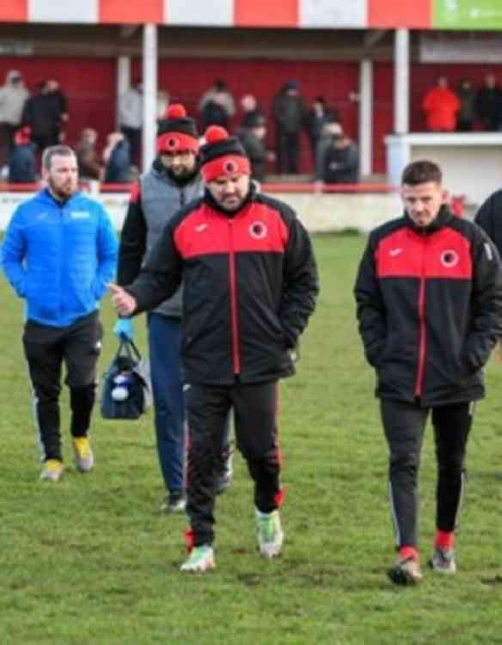 Striding out for Wembley?: Manager Scott Rickards, far right, and coach Mike Fowler walking the walk