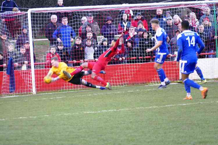 Close call: Adders Joe Obi brings a save from Worcerster keeper Dan Jezeph