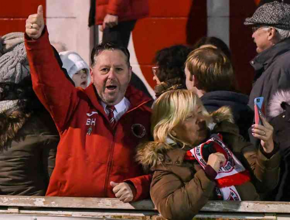 Thumbs up: Chairman Brian Henney enjoys the moment as he finds himself the subject of an impromptu selfie at the FA Vase game last night