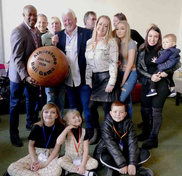 One for the family album: Stars Dave Bennett and Kirk Stephens among the new faithful for the town's ball game