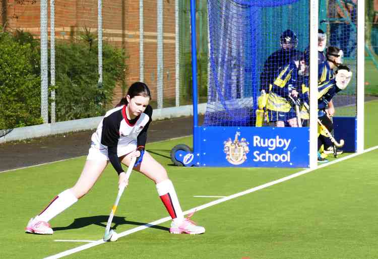 Corner force: Emily Bewsher puts in a penalty corbner leading to a gioal from Luke Iliffe