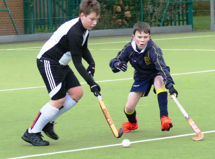 Overstretched: Felix Roberts, right, again in the thick of the action