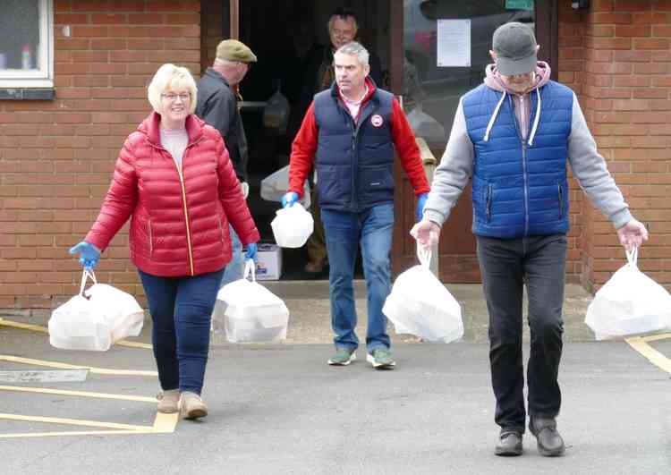 Ready for the off: The meals leave St Nicholas Church hall, Baddesley