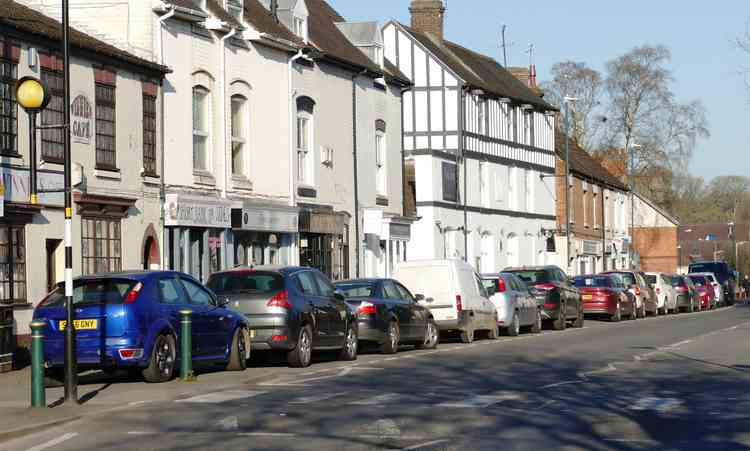 Solid: Bumper to bumper parking in Station Street