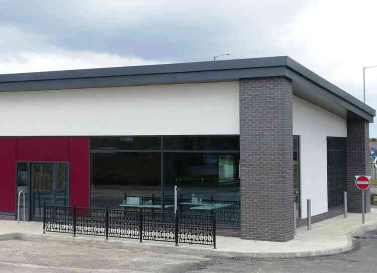 Coffee break: The three-quarters finished new Costa Coffee outlet in Grendon is still behind barriers, waiting to open