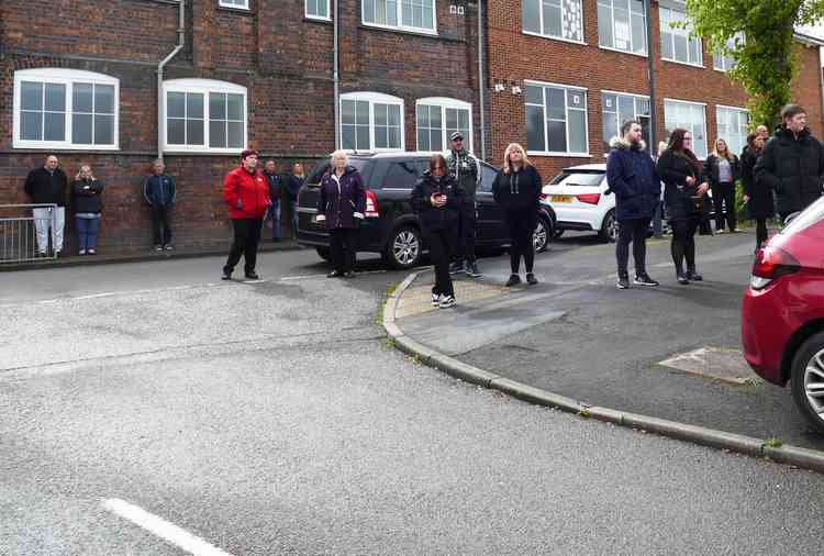 Mourners gather: On the corner of North Street and Queens Road