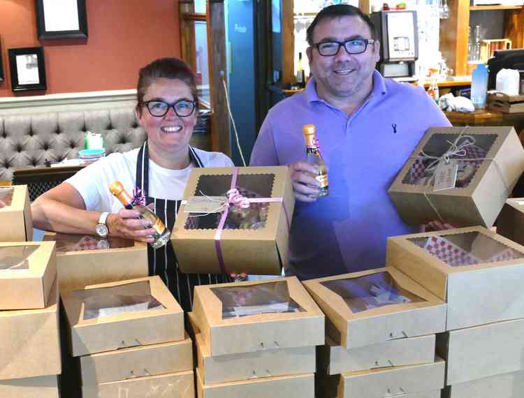 Under seige: Marie O'Brien and Shyane Morris with some of the boxes