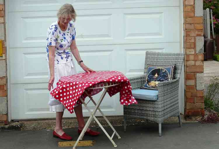 Nearly ready: An Ambien Road resident preparing the tea table