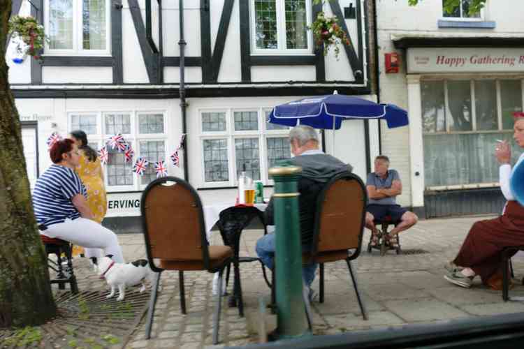 Relaxing drink; Outside The Wheatsheaf in Long Street