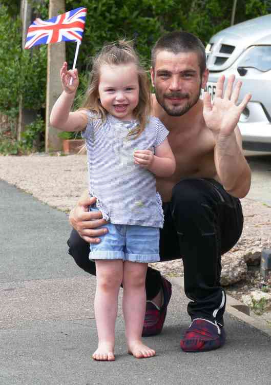 Happy days: This litle girl and her dad have a swell time