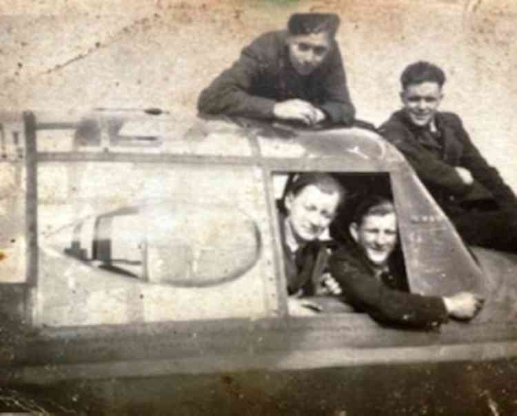 Flying high: John Cooke with RAF colleagues