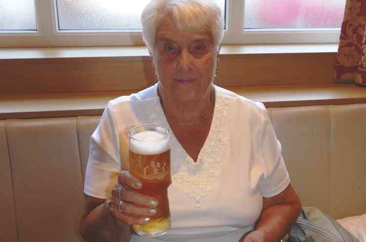 Cheers: First pint 'outside' the confines of her house for four months for Margaret Congrave, 80