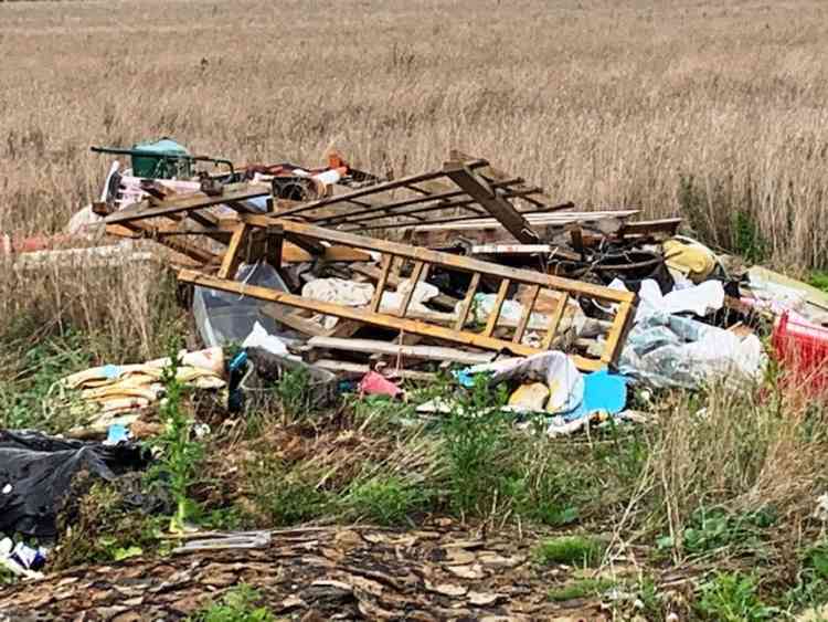 Health hazard: Fly-tipping is harmful to the environment and this is an example in Woodford Lane, Mancetter