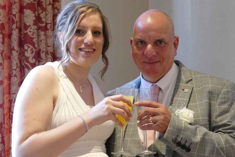 Cheers: The couple toast their 'great day'