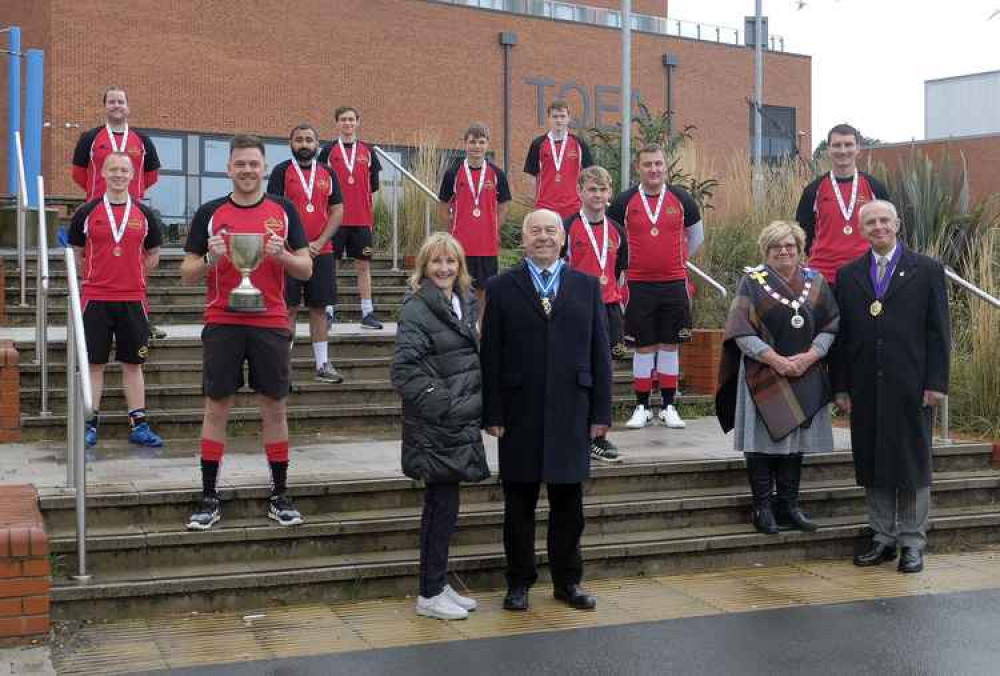 Foreground: Joe Greenwell CBE DL High Sheriff of Warwickshire and Mrs Anne Greenwell.  Right: Cllr Denise Clews Atherstone Town Mayor and Consort Cllr Tony Clews. Left (holding the Cup): Martin Webb of Atherstone Adders 1st XI Hockey (Photograph Courtesy