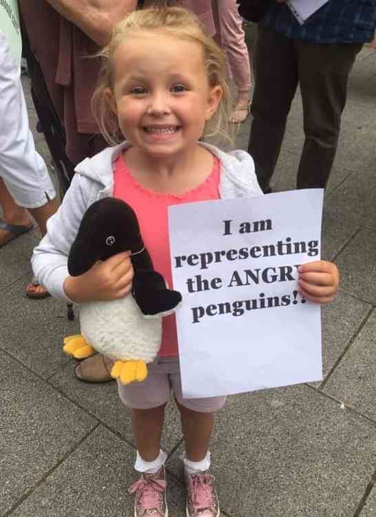 Olivia Gee aged 5 campaigning for the penguins who could not attend due to the exceptionally warm weather
