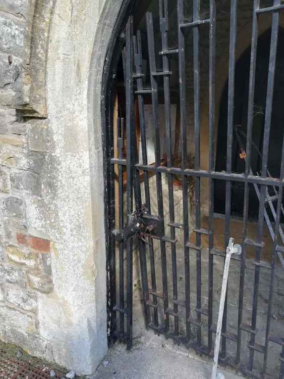 The gate, designed by Llandaff Catherdral architect George Pace, was damaged but the lock held