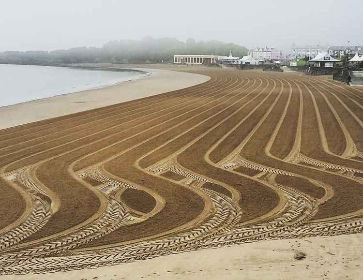 Russell's beach-cleaning work