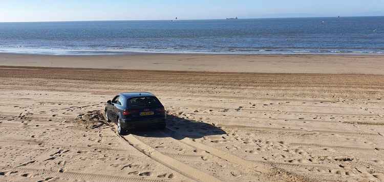 The Audi towed from Whitmore Bay (Image via Barry Beach Facebook page)