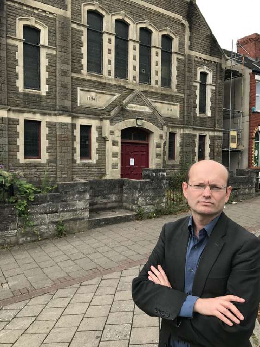 Councillor Ian Johnson standing in front of New Jerusalem Church, on Tynewydd Road in Barry