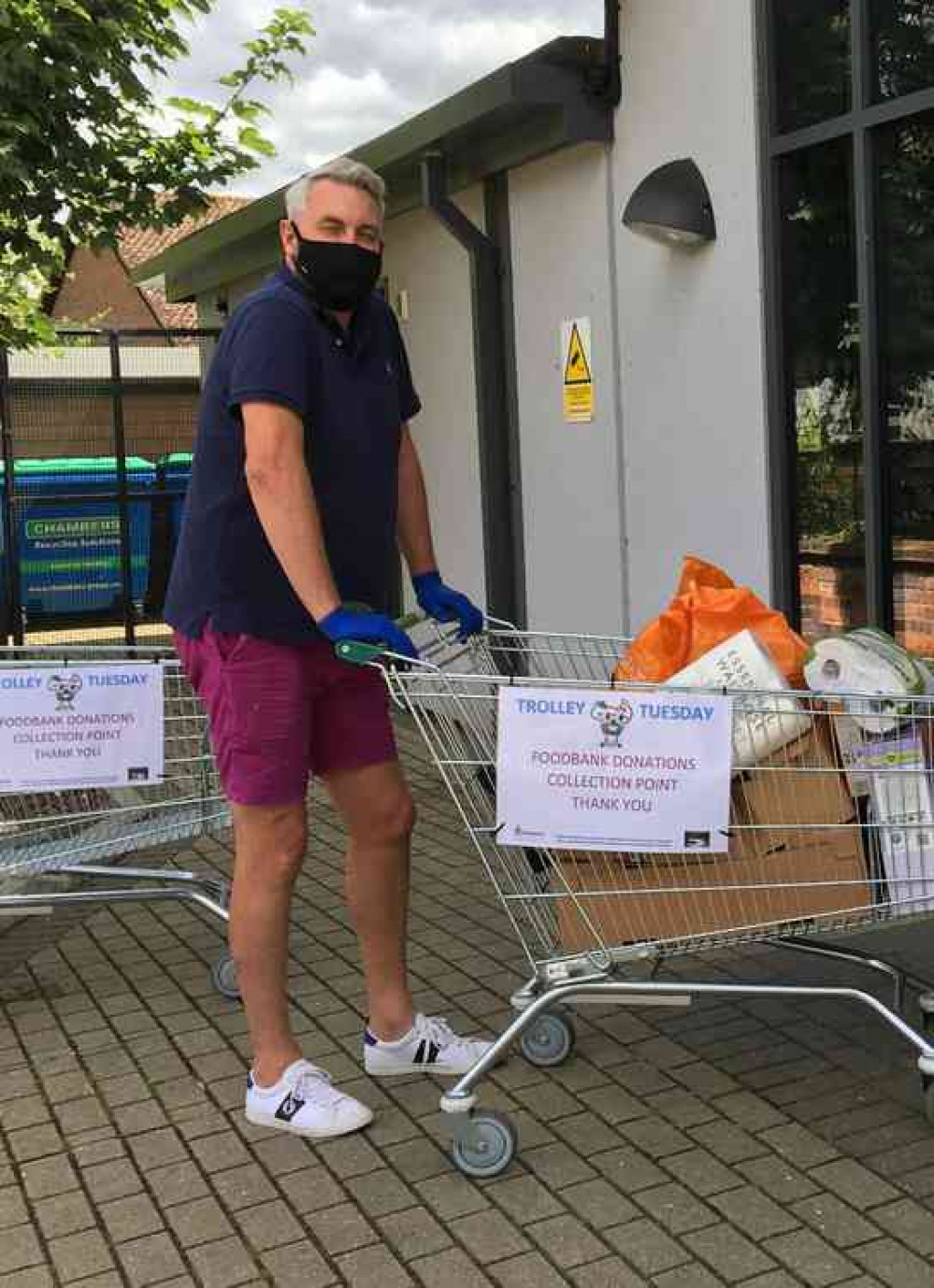 Patrick Andre with a Community Store trolley.